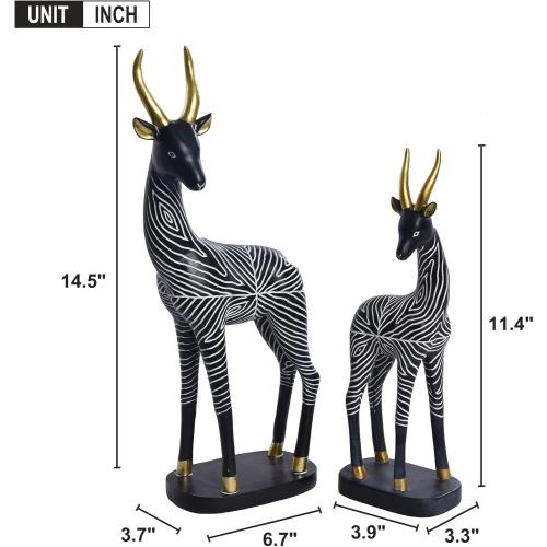 Présentation de Sculptures africaines antilope, lot 2 figurines modernes, noir en situation