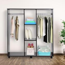 Armoire penderie mobile, meuble rangement, bois noir, 6 roulettes en situation