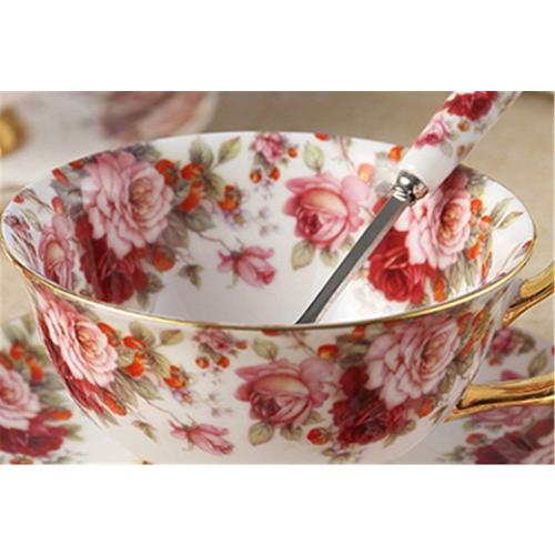 Présentation de Zoom sur Tasse à thé porcelaine, soucoupe, fleurs blanches, rouges