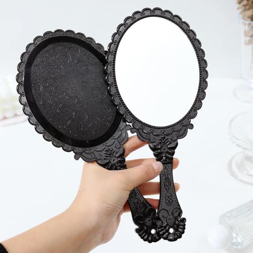 Présentation de Zoom sur Miroir à main vintage noir, ovale, maquillage voyage